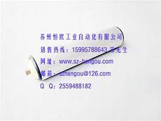 从而增大滚筒与皮带接触面积